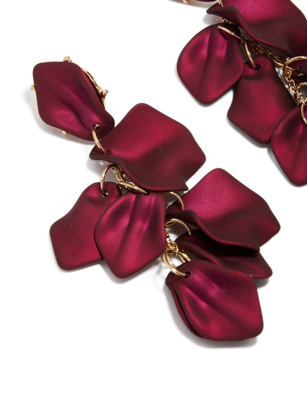 Designed with statement these burgundy coated metal petal drop earrings in maroon and gold close up view