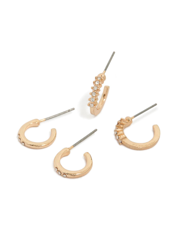 Showcasing gold simple diamante huggie earrings in a 2-pack with huggie closure front view