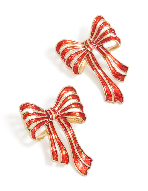 Showcasing oversized statement earrings with bow design featuring glitter striped pattern in red, white, and gold front view