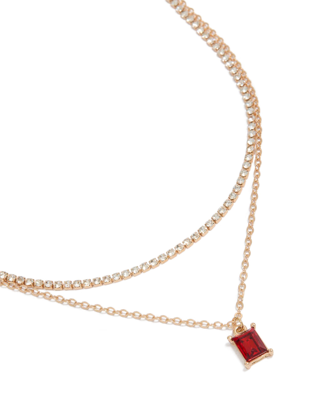 Featuring a gold cupchain red baguette layered necklace close up view