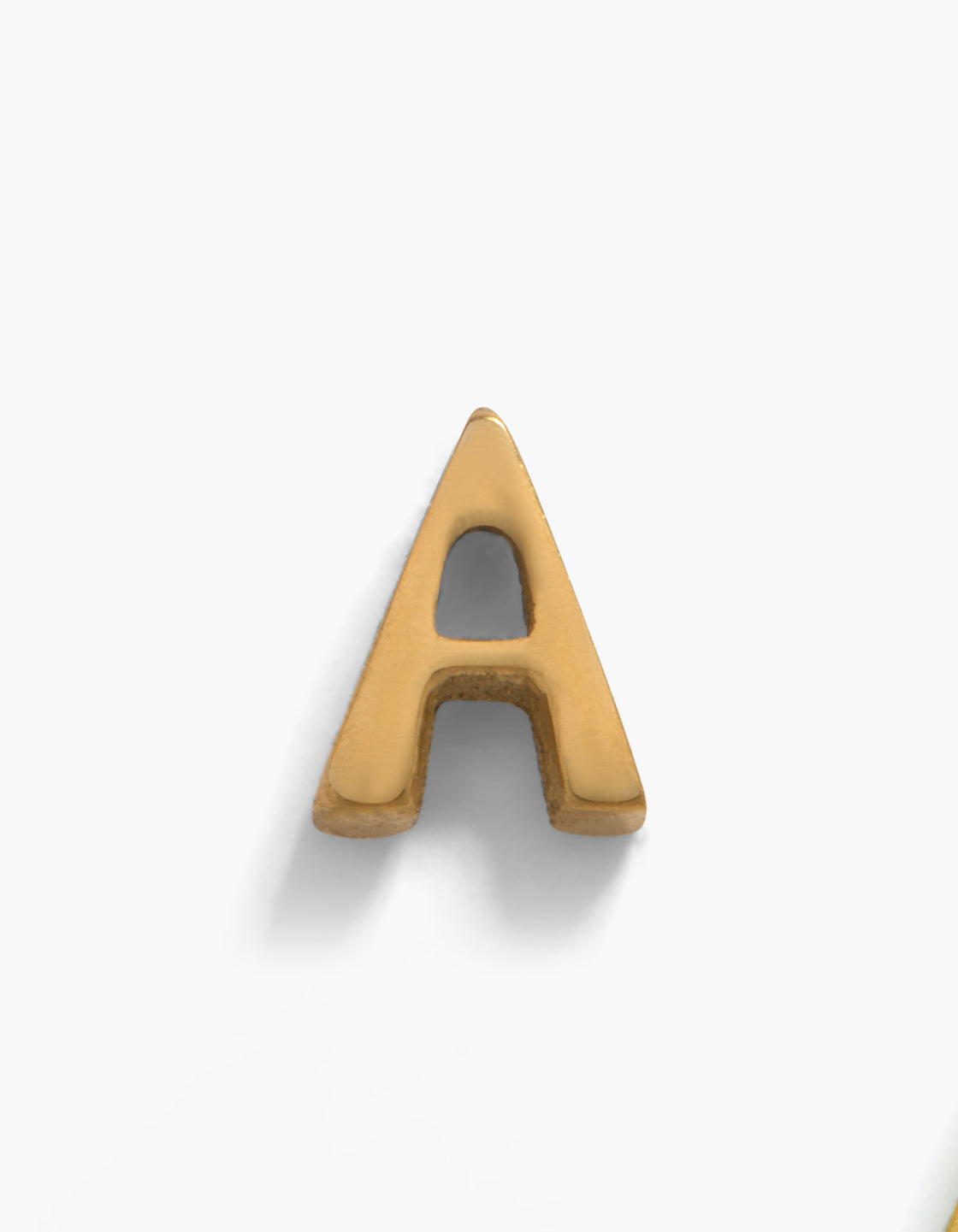 Showcasing a gold plated titanium letter A single threadless flat back stud featuring initials front view