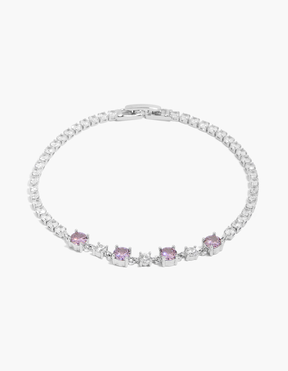 Showcasing a dainty tennis bracelet crafted from cubic zirconia in silver with purple accents front view
