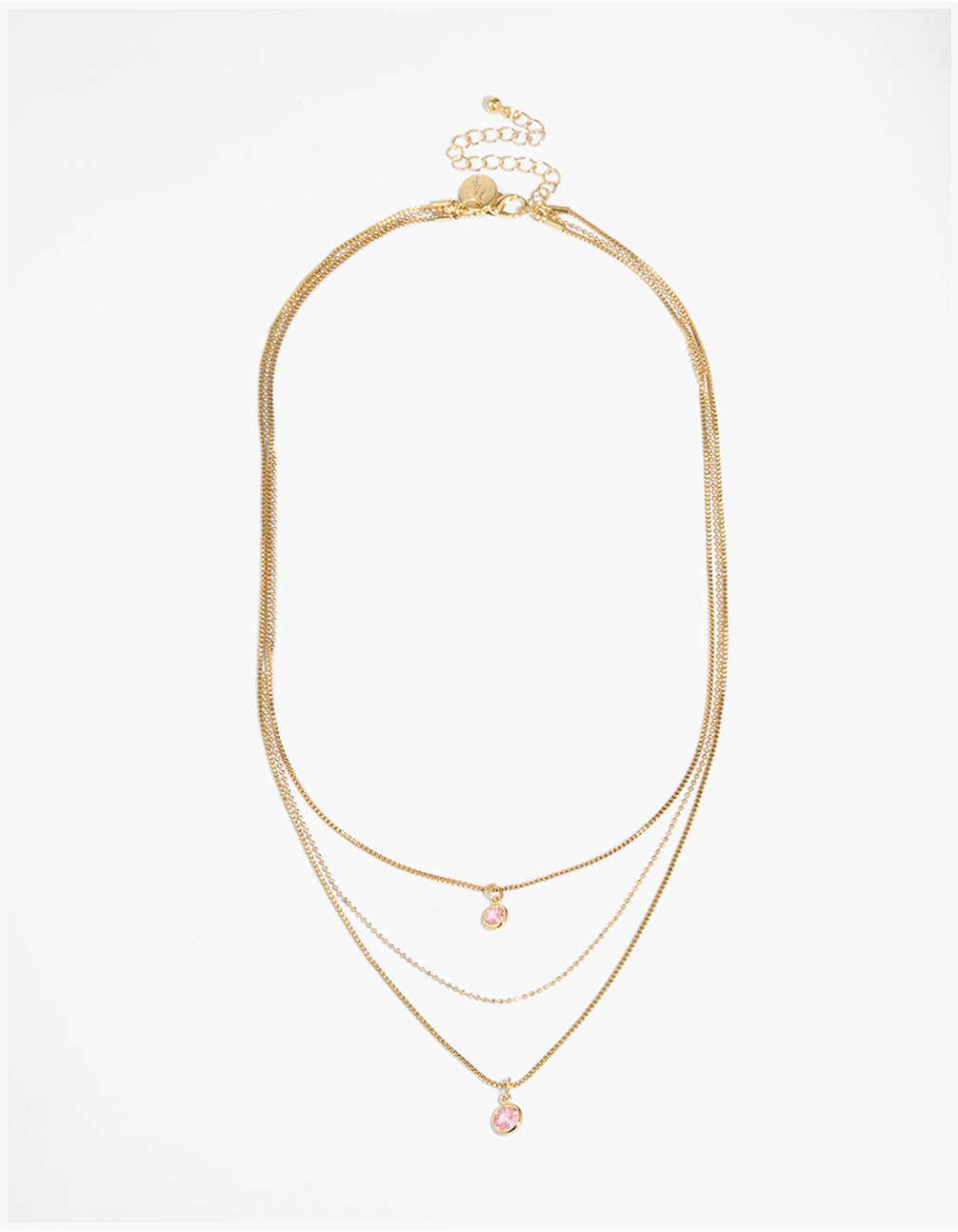 Elegant gold plated pink cubic zirconia layered necklace with charm pendant crystal and statement styling clasp detail front view