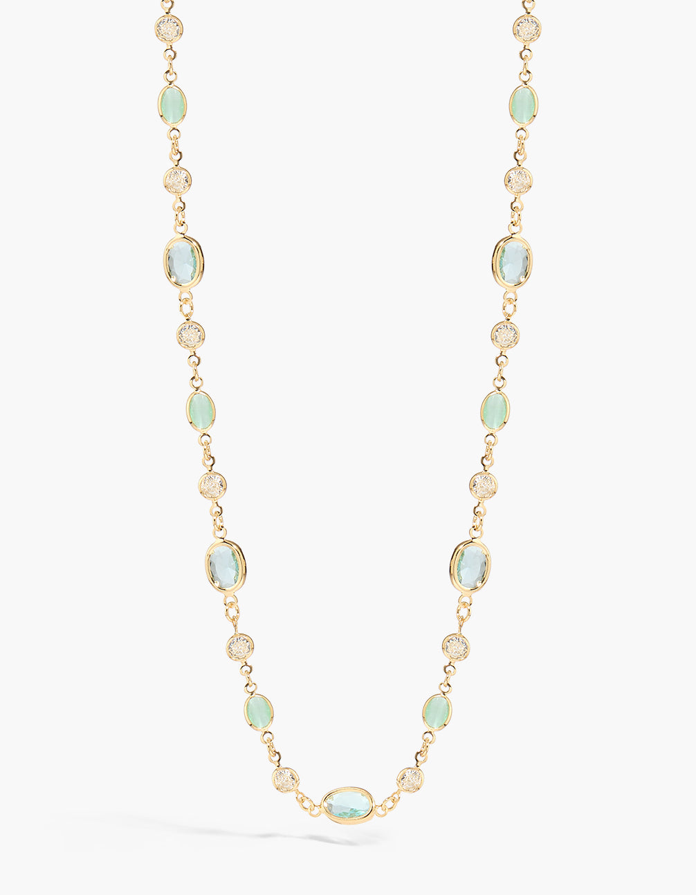 Showcasing a gold plated necklace featuring green cubic zirconia in oval close up view