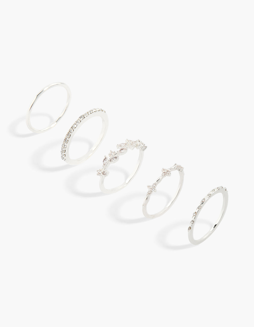 Showcasing a silver plated cubic zirconia dotted and flower vine rings 5-pack featuring floral details with crystal embellishments front view