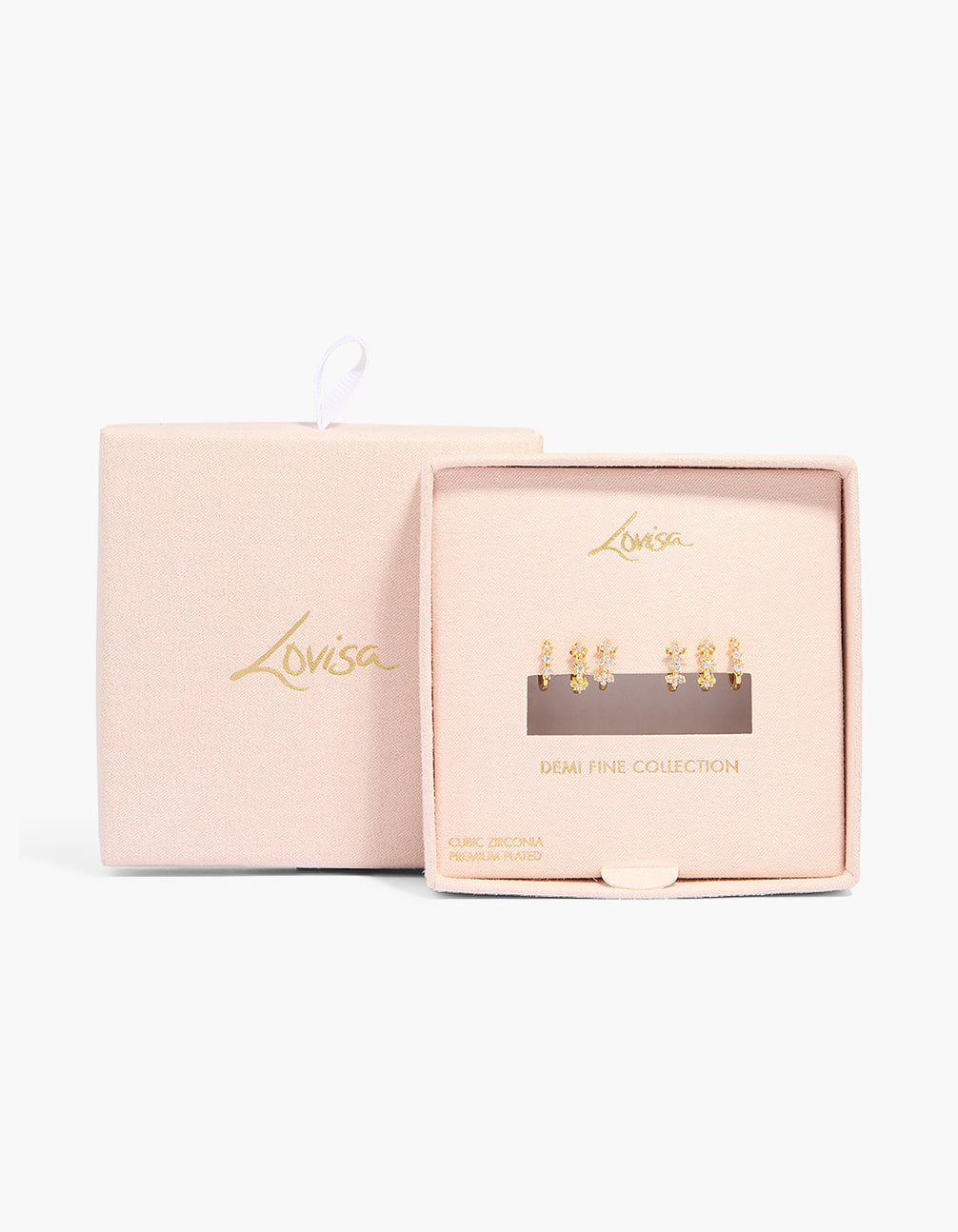 Presenting gold plated celestial mini huggie earrings in a 3-pack, crystal and cubic zirconia accents, displayed in packaging close up view