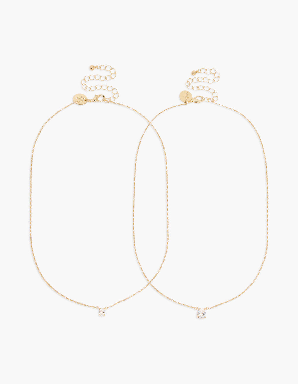These gold plated pear cubic zirconia pendant necklaces in a 2-pack with crystal accents show the clasp detail view