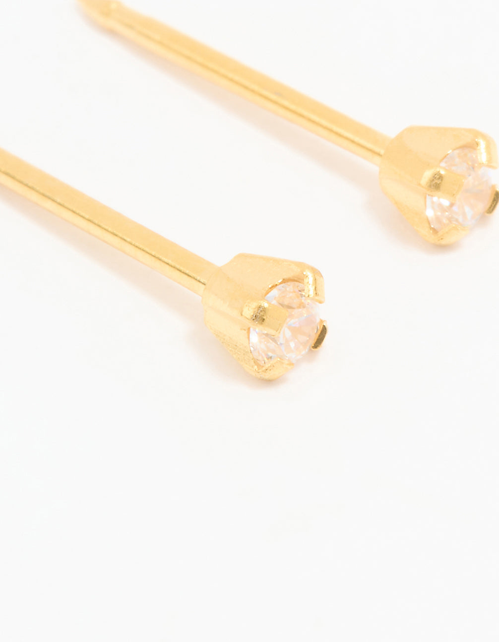 Discover this 24K gold cubic zirconia piercing stud in 2mm featuring stud closure close up view