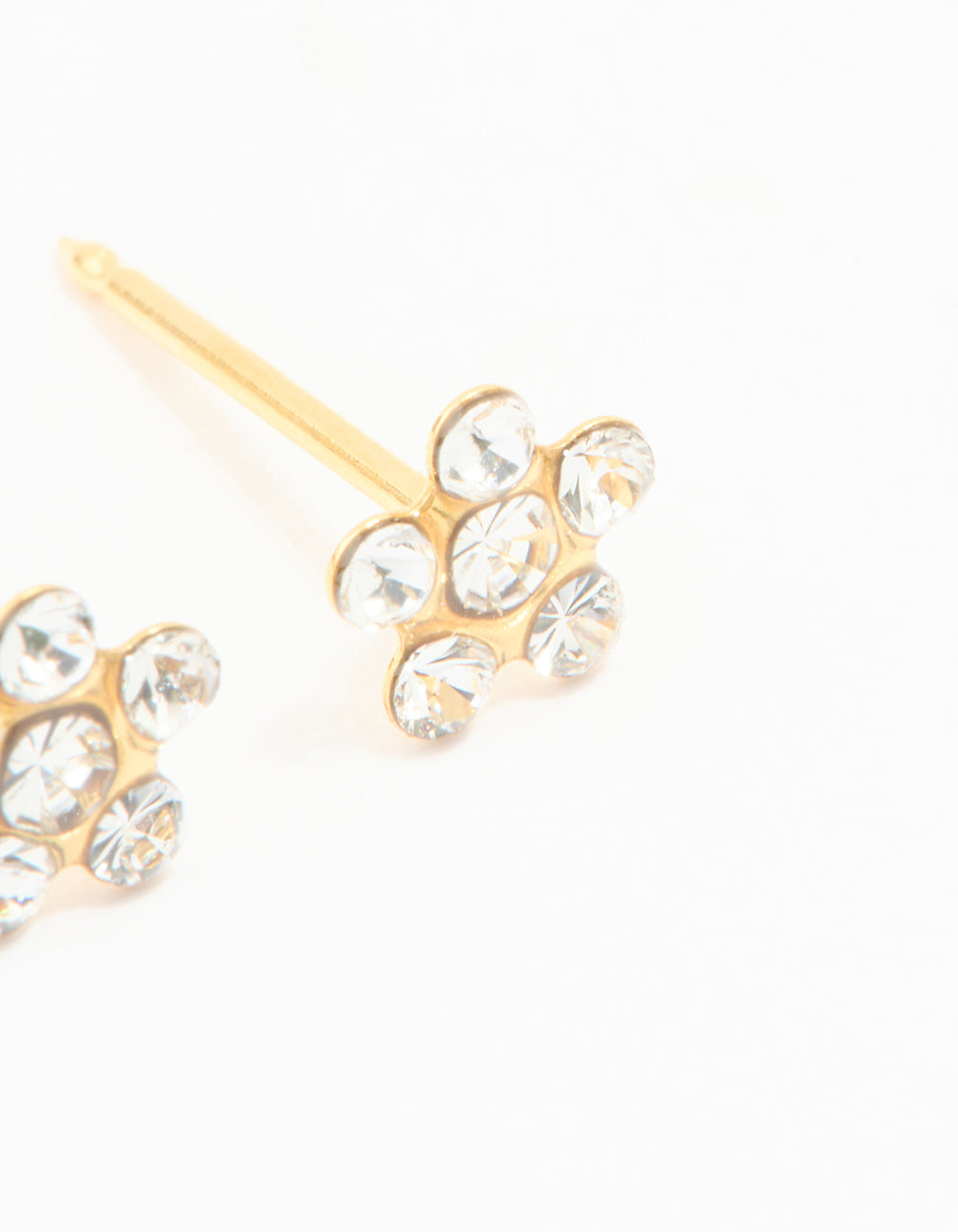 Elegantly designed 24K gold plated surgical stainless steel cubic zirconia daisy piercing stud with floral accents and dainty styling in clear post detail view