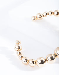 Gold Graduating Ball Cuff Bangle - link has visual effect only