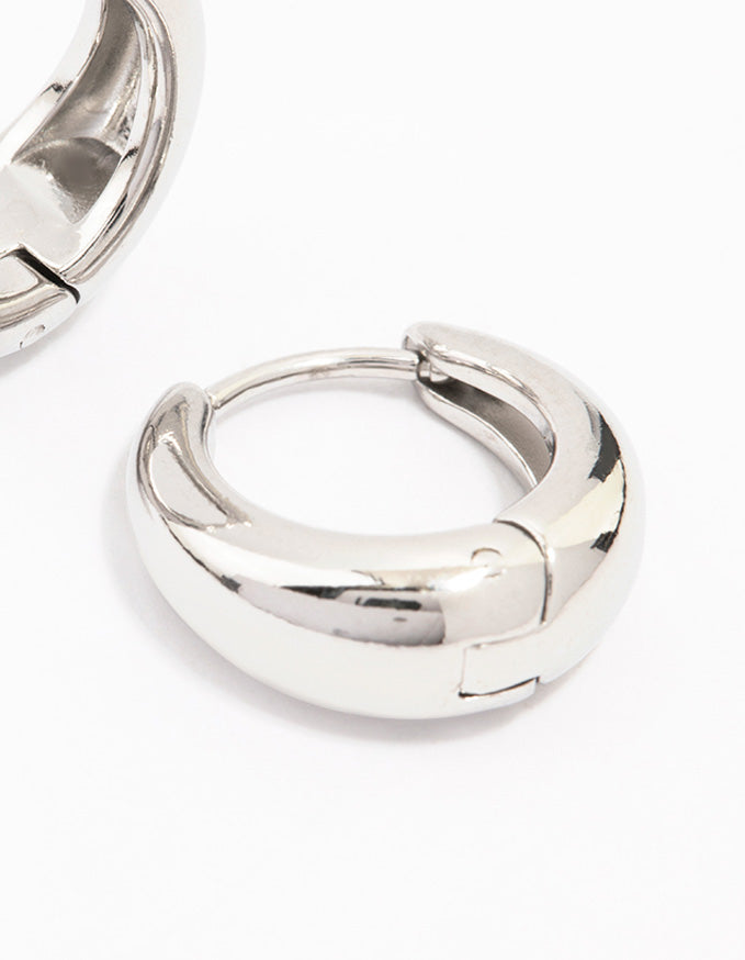 Highlighting waterproof mini drop huggie earrings crafted from stainless steel post detail view