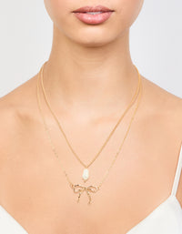 Gold Pearl & Bow Layered Necklace - link has visual effect only