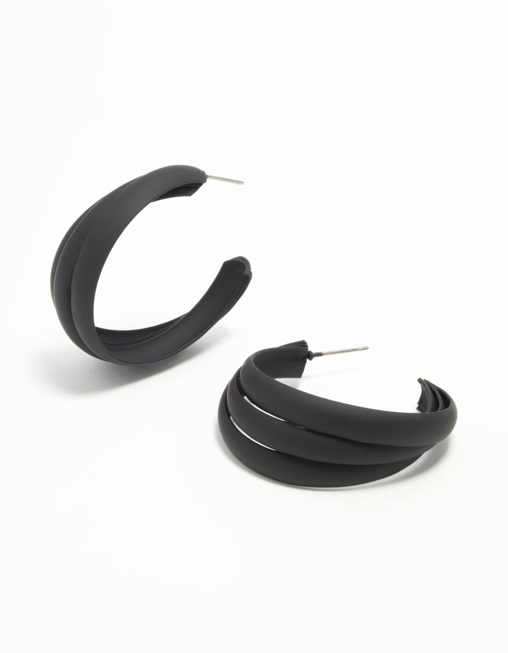 Showcasing black coated metal ridge hoop earrings with silver closure front view
