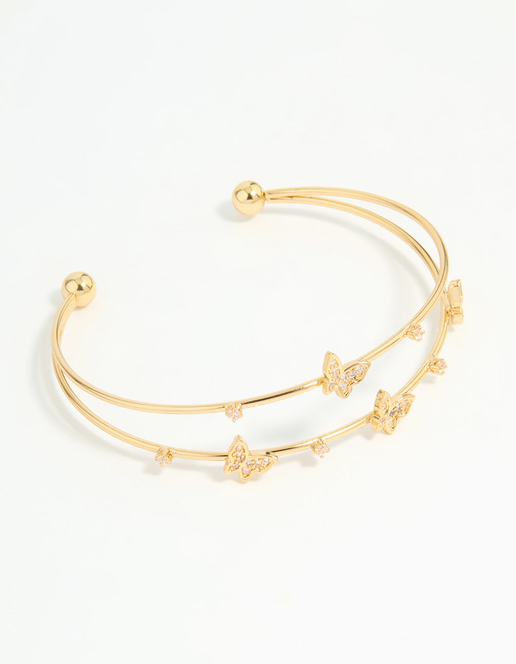 Showcasing a gold plated mini butterfly wrist cuff front view