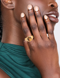 Experience a waterproof gold plated stainless steel statement stone ring with brown cabochon on finger view - link has visual effect only