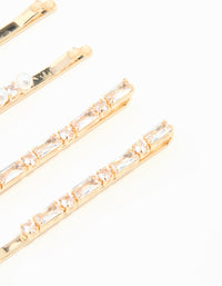 Showcasing gold cubic zirconia and pearl hair clips in a 6-pack detail view - link has visual effect only