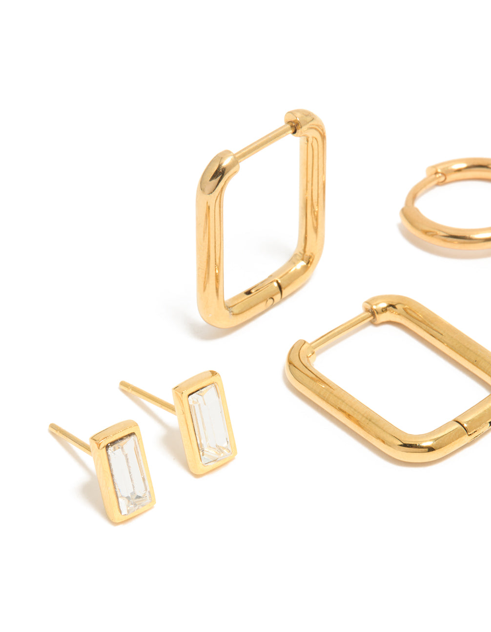 Showcasing waterproof gold plated stainless steel cubic zirconia stud and hoop earrings in a 3-pack close up view