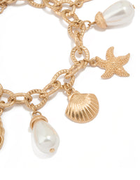Worn Gold Starfish & Shell Pearl Bracelet - link has visual effect only