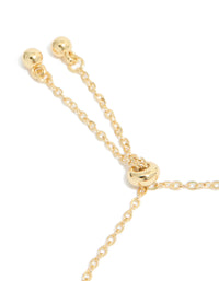 Highlighting gold plated cubic zirconia butterfly and heart toggle bracelet closure detail view - link has visual effect only