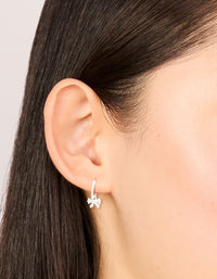 Sterling Silver Cubic Zirconia Bow Charm Huggie Earrings - link has visual effect only