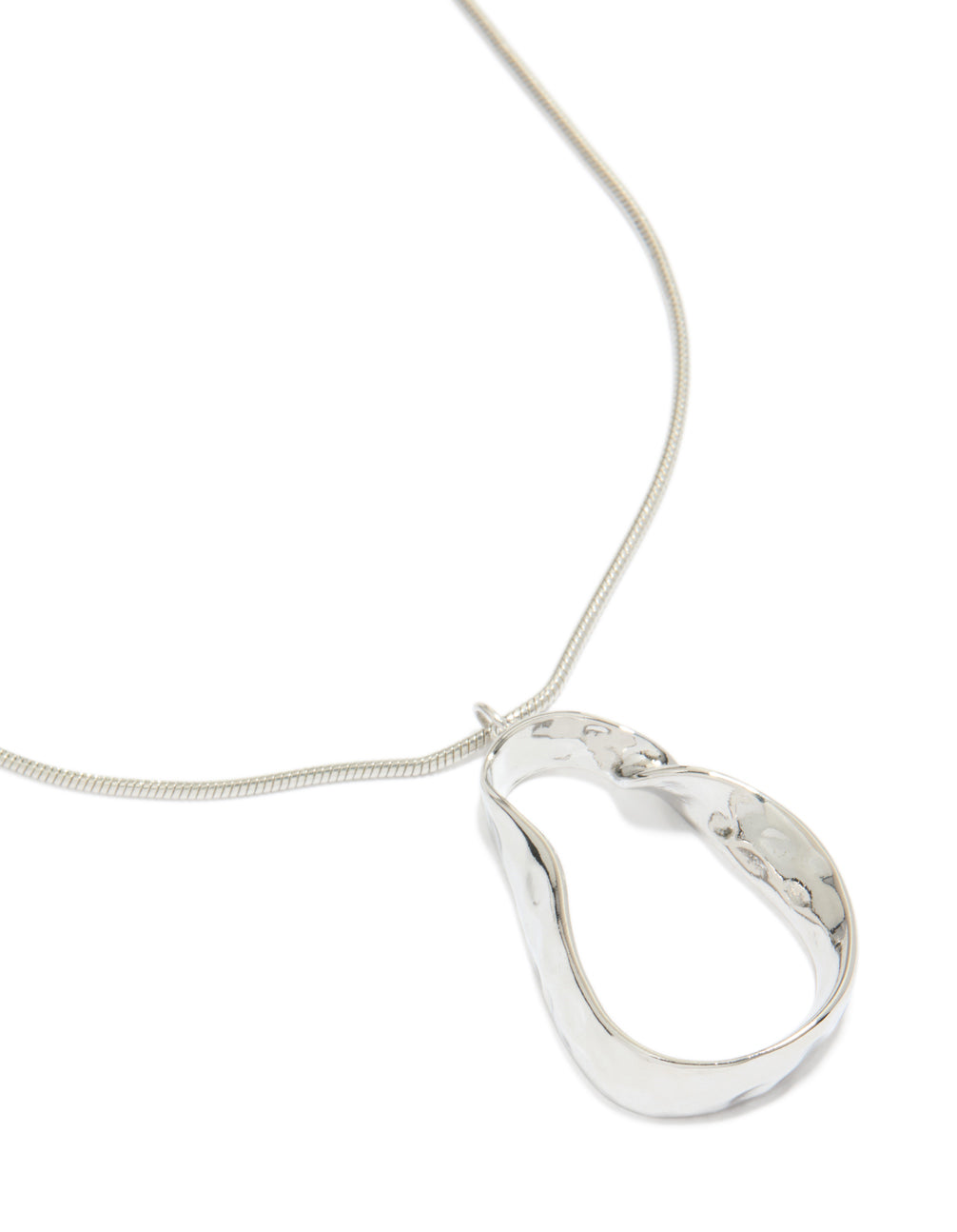 Showcasing a silver metal chain pendant necklace with statement styling close up view