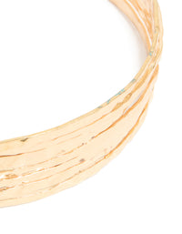 Featuring a gold choker layered necklace in close up view - link has visual effect only