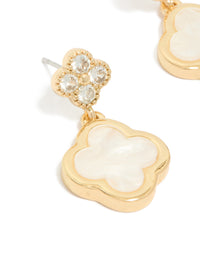 Elegant gold plated cubic zirconia drop earrings with double floral motif and ivory detailing close up view - link has visual effect only