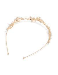 Crafted from cubic zirconia and pearl with gold finish side view - link has visual effect only