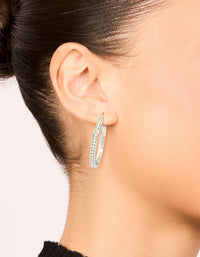 Featuring waterproof stainless steel diamante hoop earrings in silver 35 MM on ear view - link has visual effect only