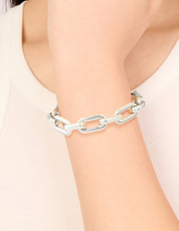 Featuring a waterproof stainless steel large paperclip chain bracelet in silver with statement style on wrist view - link has visual effect only