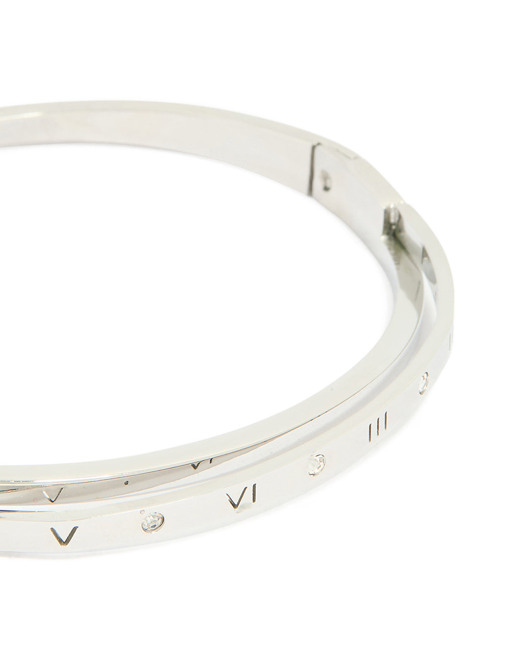 Highlighting a waterproof stainless steel diamante Roman numeral hinge bangle in silver with engraved numbers and statement appeal close up view