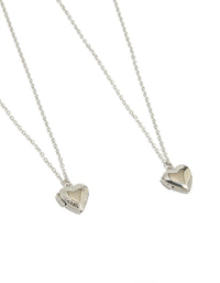 Featuring heart locket pendant necklaces crafted from waterproof stainless steel in silver, available as a 2-pack close up view - link has visual effect only