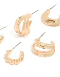 Featuring dainty chunky earrings with textured huggie closure in gold, 3 pack close up view - link has visual effect only