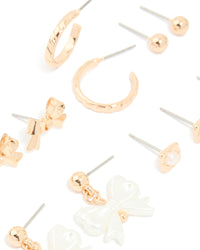 Gold Pearl Bow Stud Earrings 7-Pack - link has visual effect only