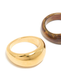 Crafted from waterproof gold plated stainless steel and brown modern stacking rings in a 2-pack with chunky style and glitter close up view - link has visual effect only