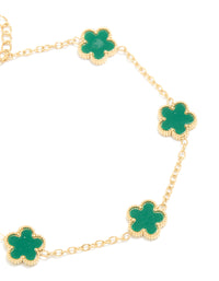 Designed with waterproof gold plated stainless steel dark green petal flower charm bracelet close up view - link has visual effect only