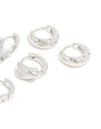 Showcasing chunky huggie earrings made from waterproof stainless steel in silver, displayed as a 3-pack post detail view - link has visual effect only