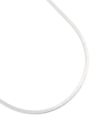 Showcasing a waterproof stainless steel fine flat snake chain necklace in silver close up view - link has visual effect only