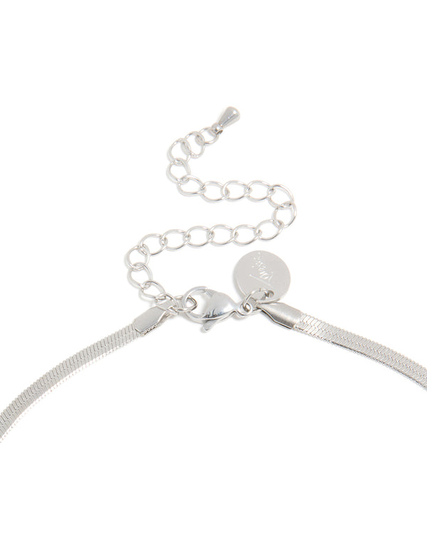 Displaying a waterproof stainless steel fine flat snake chain necklace in silver clasp detail view