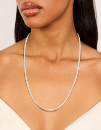 Showcasing a waterproof stainless steel short snake chain necklace in silver on neck view - link has visual effect only