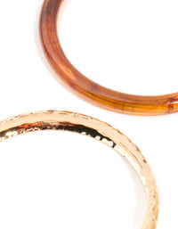 Gold & White Resin Textured Bangles 4-Pack - link has visual effect only