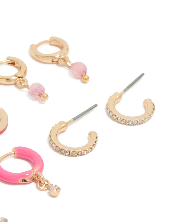 Elegantly designed gold diamante and pink enamel hoop earrings 5-pack with beads closure post detail view