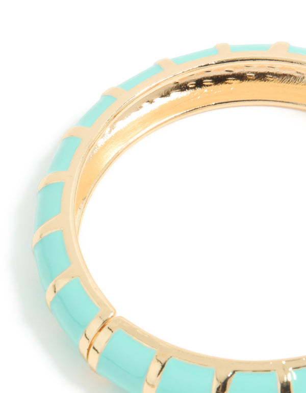 Featuring an aqua enamel stripe bangle in gold close up view