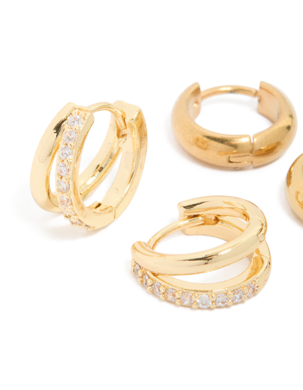 Featuring waterproof chunky diamante huggie earrings in a 2-pack, made from stainless steel with cubic zirconia ,crystal accents and gold plating in a close up view