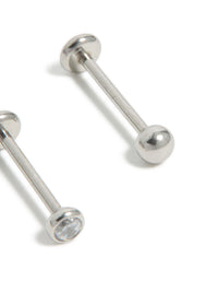 Designed with titanium bezel cubic zirconia threadless flat back nose studs featuring ball accents in silver close up view - link has visual effect only
