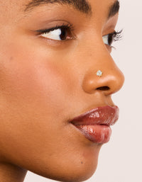 Showcasing gold plated titanium cubic zirconia threadless flat back nose stud nose view - link has visual effect only