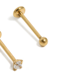 Highlighting gold plated titanium cubic zirconia threadless flat back nose stud with claw setting detail close up view - link has visual effect only