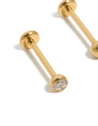 Highlighting gold-plated titanium bezel threadless flat back nose studs crafted with ball accents and diamond embellishments close up view - link has visual effect only