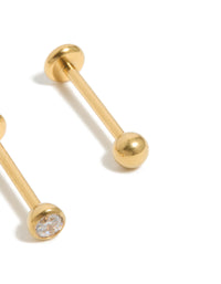 Highlighting gold-plated titanium bezel threadless flat back nose studs crafted with ball accents and diamond embellishments close up view - link has visual effect only