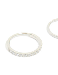 Showcasing surgical steel cubic zirconia hinged and plain nose rings in a 2-pack with diamond accents and silver finish close up view - link has visual effect only